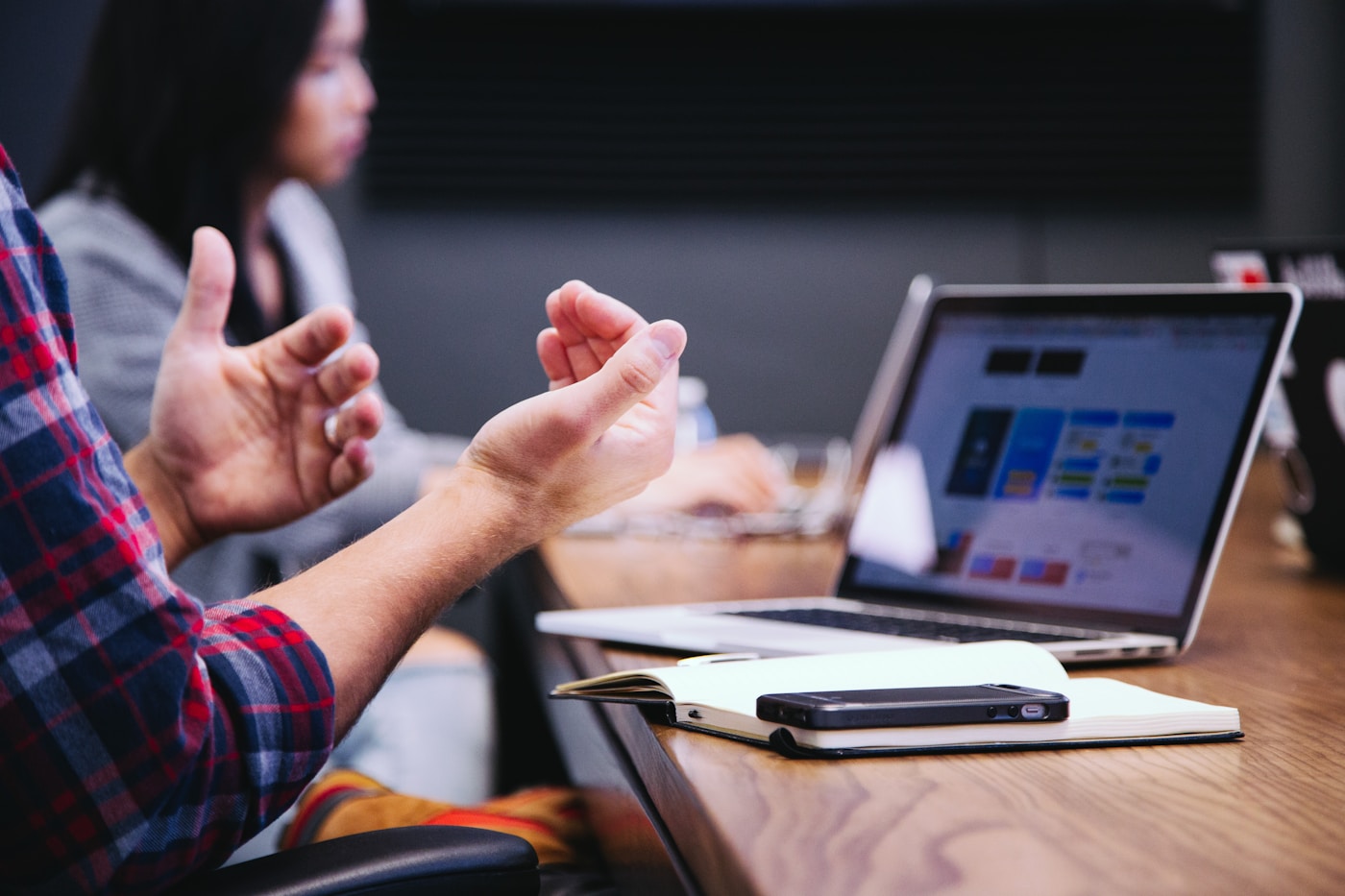 People reviewing benefit guidance together